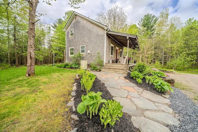 603 S Freedom Rd, Albion, ME 04910 - view of home's exterior with a yard