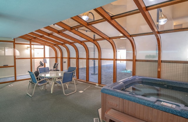 215 E Grand Ave Unit 210, Old Orchard Beach, ME 04064 - sunroom / solarium with a jacuzzi and outdoor dining space