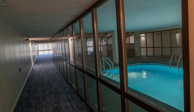 215 E Grand Ave Unit 210, Old Orchard Beach, ME 04064 - hall with carpet and baseboards