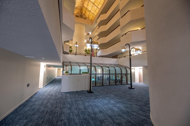 215 E Grand Ave Unit 210, Old Orchard Beach, ME 04064 - building lobby featuring a high ceiling