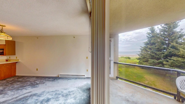215 E Grand Ave Unit 210, Old Orchard Beach, ME 04064 - unfurnished sunroom featuring a baseboard heating unit