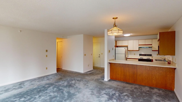 215 E Grand Ave Unit 210, Old Orchard Beach, ME 04064 - kitchen featuring range with electric stovetop, freestanding refrigerator, dark colored carpet, under cabinet range hood, and light countertops