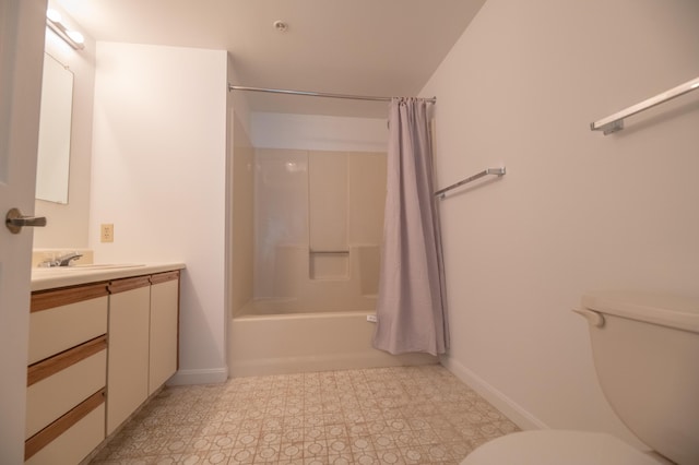 215 E Grand Ave Unit 210, Old Orchard Beach, ME 04064 - bathroom with toilet, vanity, shower / tub combo, and baseboards
