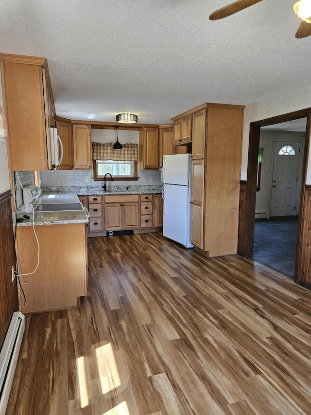 1377 Pushaw Rd, Glenburn, ME 04401 - kitchen with white appliances, baseboard heating, dark wood-style floors, a sink, and a textured ceiling