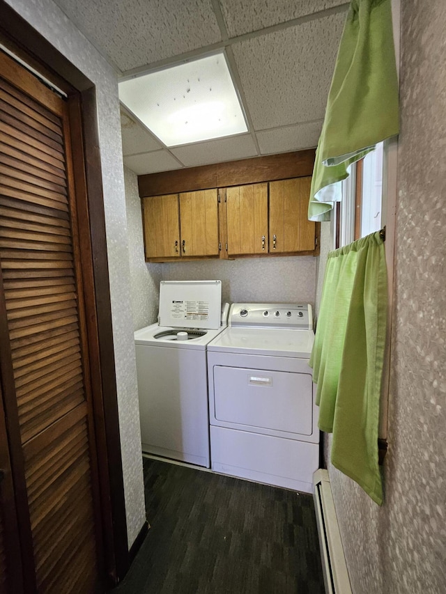 1377 Pushaw Rd, Glenburn, ME 04401 - clothes washing area with separate washer and dryer, dark wood finished floors, cabinet space, and a baseboard radiator