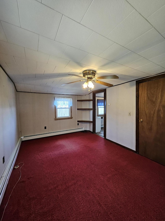 1377 Pushaw Rd, Glenburn, ME 04401 - unfurnished bedroom with a baseboard radiator, carpet, baseboard heating, and baseboards