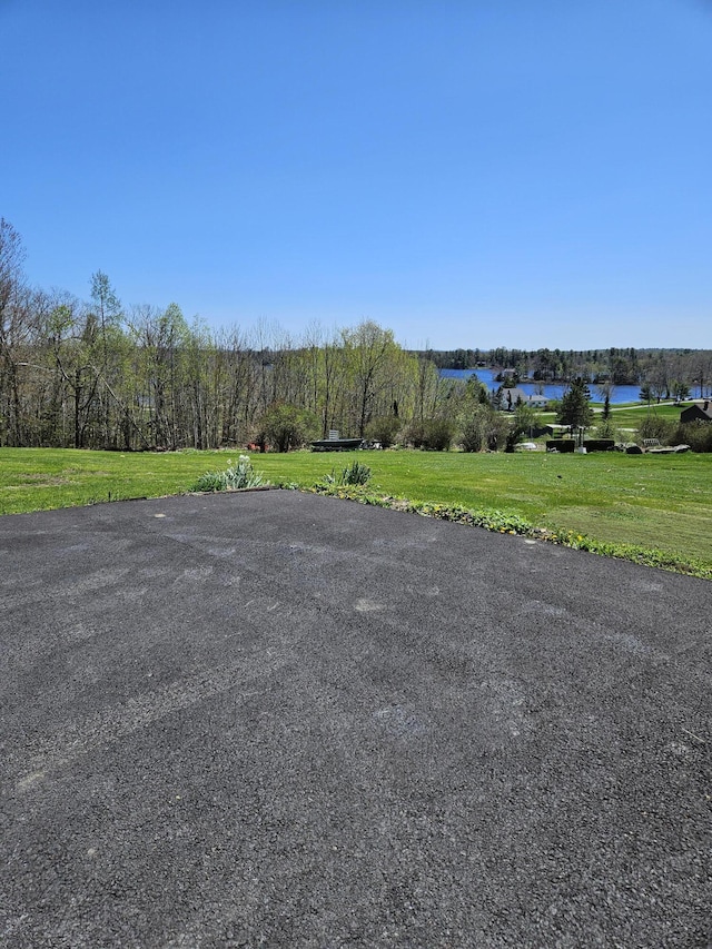 1377 Pushaw Rd, Glenburn, ME 04401 - view of road featuring a water view