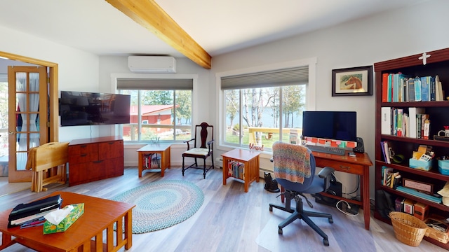 11 Beethoven Ln, Enfield, ME 04493 - office featuring a wall mounted air conditioner, beam ceiling, healthy amount of natural light, and wood finished floors