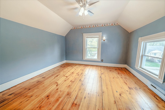 77 Cottage St, Bangor, ME 04401 - bonus room featuring light wood-style flooring, a baseboard heating unit, lofted ceiling, baseboards, and ceiling fan
