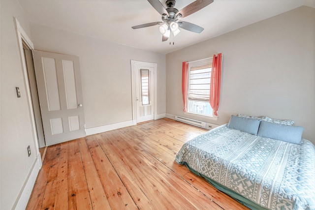 77 Cottage St, Bangor, ME 04401 - bedroom featuring baseboard heating, wood-type flooring, baseboards, and ceiling fan
