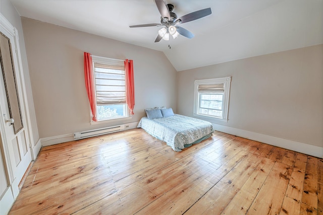 77 Cottage St, Bangor, ME 04401 - bedroom featuring baseboard heating, vaulted ceiling, hardwood / wood-style flooring, and a ceiling fan