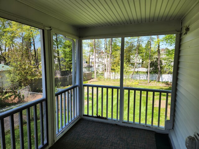 77 Cottage St, Bangor, ME 04401 - unfurnished sunroom with view of scattered trees