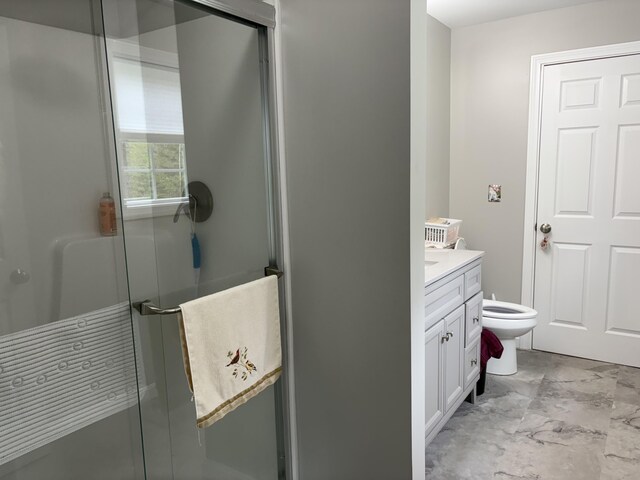 38 Deer Ridge Ln, Windsor, ME 04363 - bathroom with a shower with door, vanity, and toilet