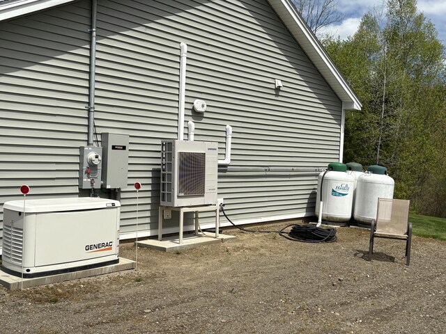38 Deer Ridge Ln, Windsor, ME 04363 - view of property exterior with ac unit
