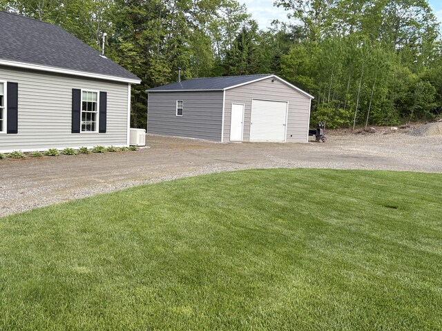 38 Deer Ridge Ln, Windsor, ME 04363 - detached garage with cooling unit