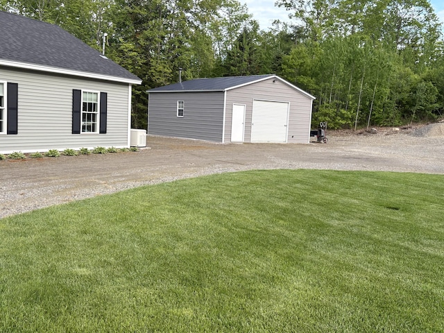 38 Deer Ridge Ln, Windsor, ME 04363 - detached garage with cooling unit