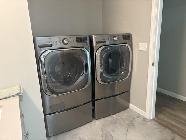 38 Deer Ridge Ln, Windsor, ME 04363 - laundry room with washer and dryer and baseboards