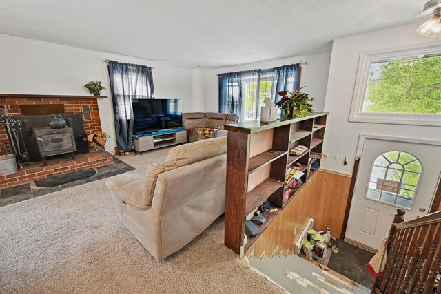 5 Skyline Dr, Chelsea, ME 04330 - living room with carpet flooring and a wood stove
