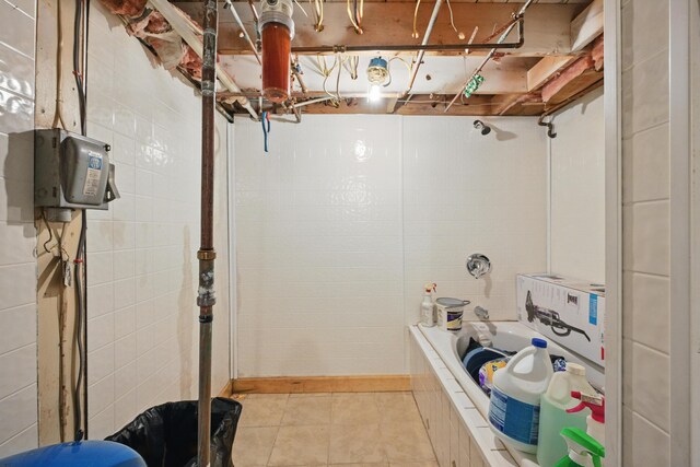 5 Skyline Dr, Chelsea, ME 04330 - unfinished basement with light tile patterned floors