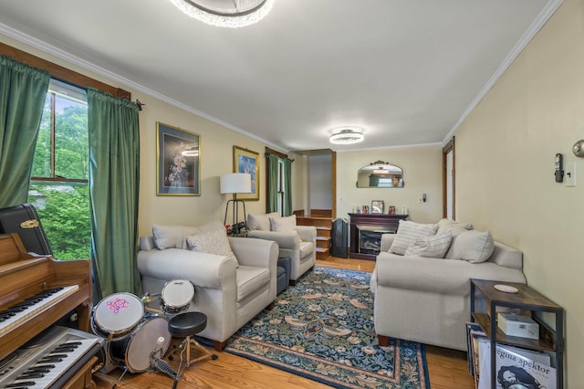 148 Water St, Randolph, ME 04346 - living room featuring crown molding and wood finished floors
