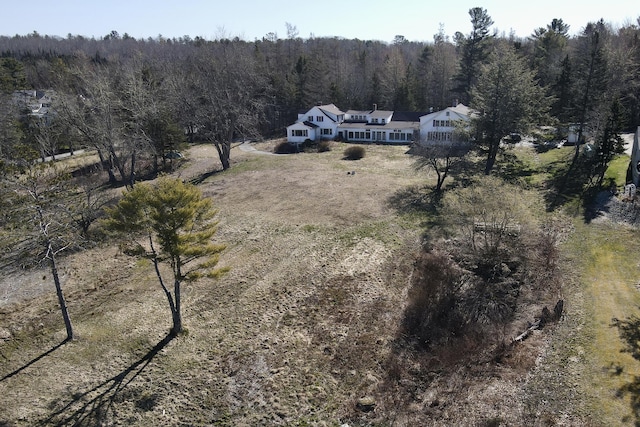 884 Surry Rd, Surry, ME 04684 - aerial view of property and surrounding area featuring a heavily wooded area