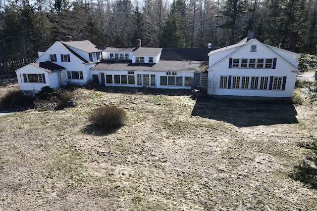 884 Surry Rd, Surry, ME 04684 - rear view of property featuring a chimney