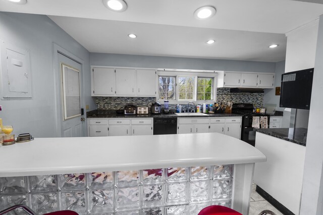 42 Sugarloaf Ln, Bangor, ME 04401 - kitchen featuring black appliances, a sink, white cabinetry, decorative backsplash, and recessed lighting