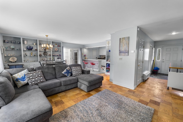 42 Sugarloaf Ln, Bangor, ME 04401 - living area with a chandelier and baseboards