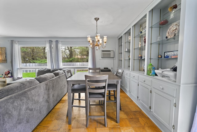 42 Sugarloaf Ln, Bangor, ME 04401 - dining area with a chandelier and an AC wall unit