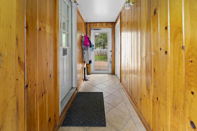 42 Sugarloaf Ln, Bangor, ME 04401 - entryway featuring wood walls and light tile patterned flooring