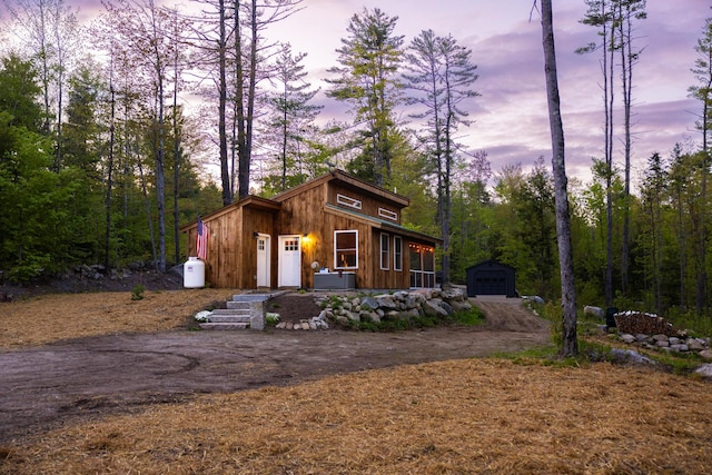 6 Ben Hale Rd, Waterford, ME 04088 - view of front of property with driveway, an outbuilding, and a garage