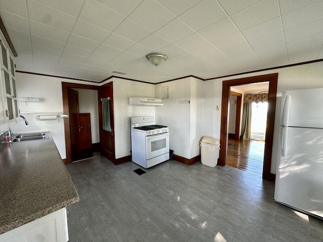 5 Polka Valley Rd, Sedgwick, ME 04676 - kitchen featuring white appliances, under cabinet range hood, white cabinets, and dark countertops