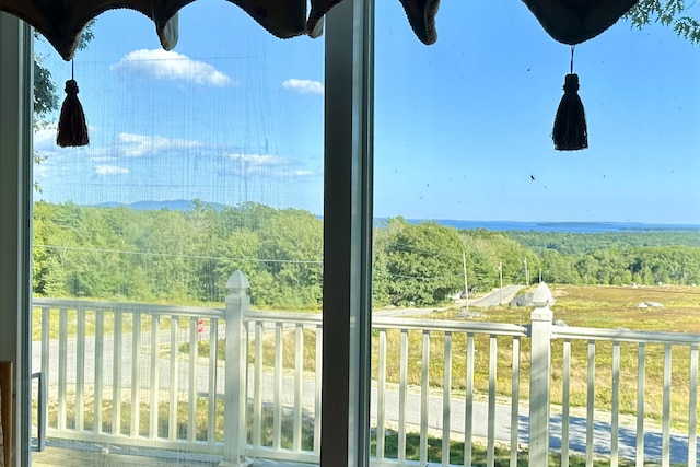 5 Polka Valley Rd, Sedgwick, ME 04676 - balcony featuring a wooded view