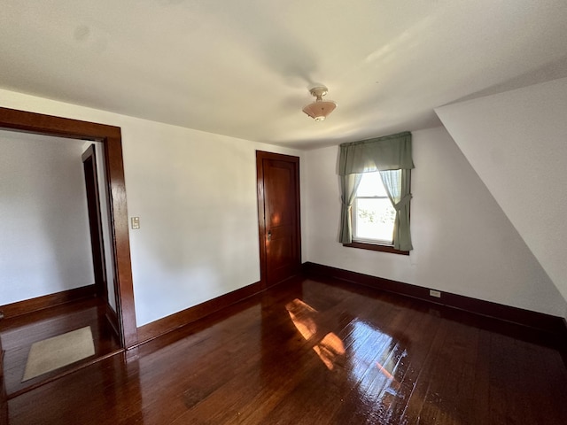5 Polka Valley Rd, Sedgwick, ME 04676 - unfurnished bedroom featuring dark wood finished floors and a closet