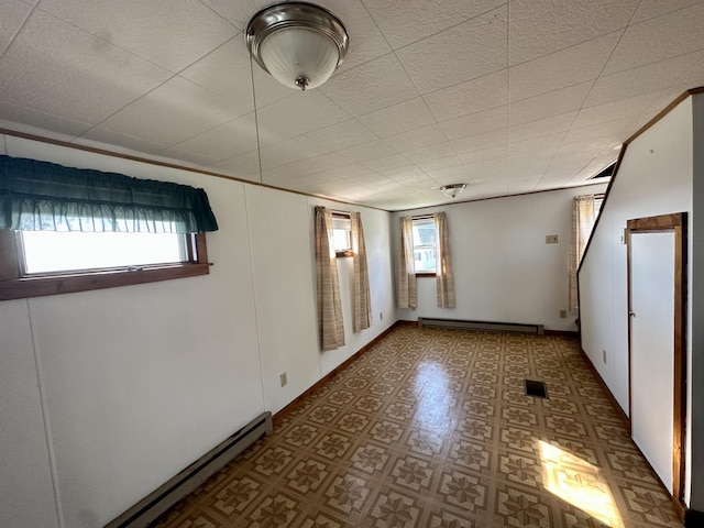 5 Polka Valley Rd, Sedgwick, ME 04676 - spare room with a baseboard radiator and tile patterned floors