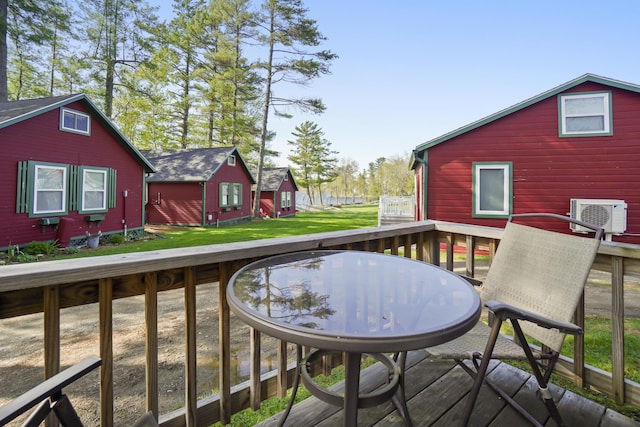 1270 Lakeview Dr Unit 11, China, ME 04358 - deck featuring a cooling unit, outdoor dining area, and a lawn
