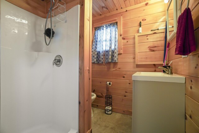 1270 Lakeview Dr Unit 11, China, ME 04358 - full bath featuring a stall shower, wood walls, vanity, wooden ceiling, and toilet