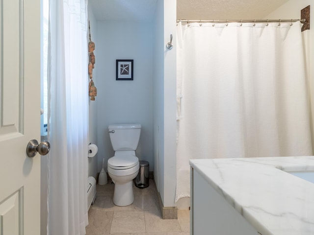 19 Brookside Dr, Falmouth, ME 04105 - bathroom with toilet and a baseboard heating unit