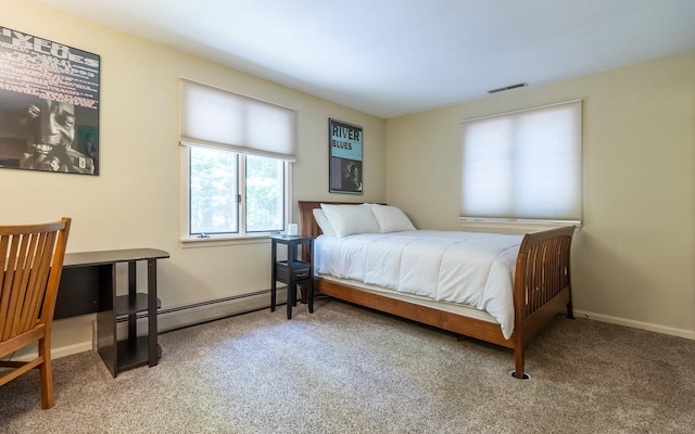19 Brookside Dr, Falmouth, ME 04105 - carpeted bedroom with a baseboard heating unit