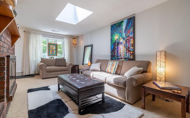 19 Brookside Dr, Falmouth, ME 04105 - living room featuring carpet, a skylight, a fireplace, and a baseboard radiator