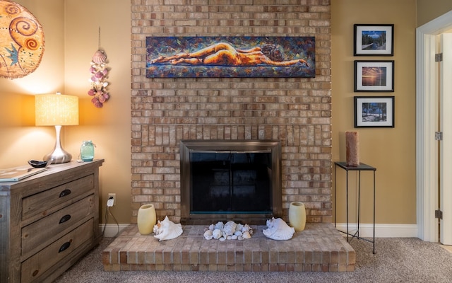 19 Brookside Dr, Falmouth, ME 04105 - detailed view of carpet, a brick fireplace, and baseboards