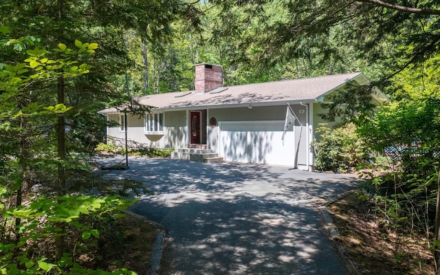 19 Brookside Dr, Falmouth, ME 04105 - ranch-style house featuring driveway, a chimney, and a garage