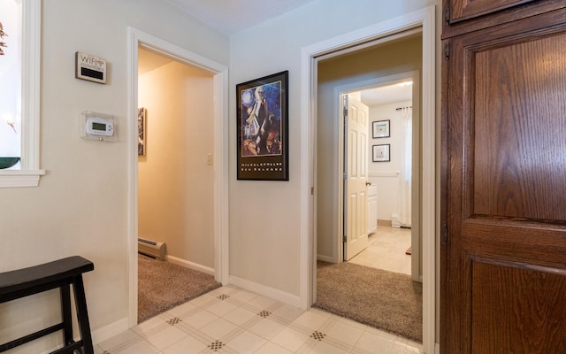 19 Brookside Dr, Falmouth, ME 04105 - hallway with a baseboard radiator, light colored carpet, baseboards, and light floors