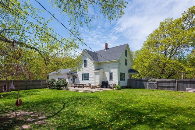 34 Admonten Ave, Rockland, ME 04841 - rear view of house with a patio and a chimney