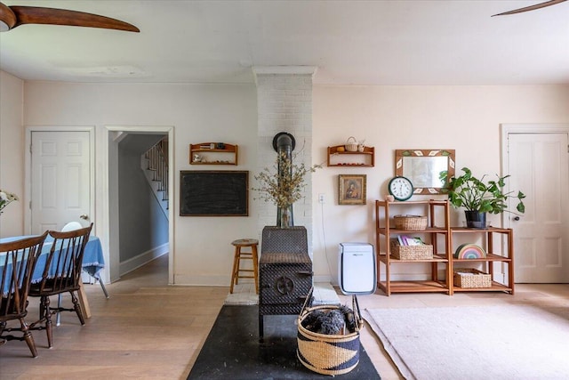 34 Admonten Ave, Rockland, ME 04841 - living area with stairway, light wood-style flooring, ceiling fan, and baseboards
