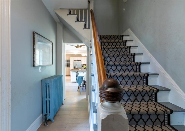 34 Admonten Ave, Rockland, ME 04841 - stairs featuring radiator heating unit and wood finished floors
