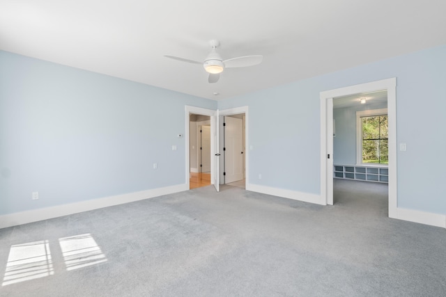246 Coombs Rd, Brunswick, ME 04011 - unfurnished bedroom featuring carpet, baseboards, and a ceiling fan