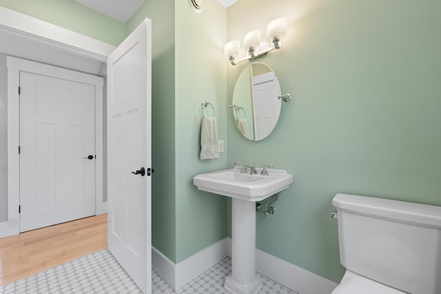 246 Coombs Rd, Brunswick, ME 04011 - bathroom with toilet, baseboards, and tile patterned floors