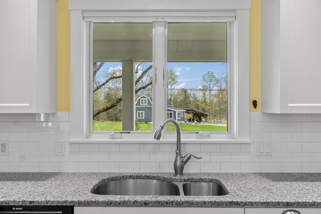 246 Coombs Rd, Brunswick, ME 04011 - kitchen featuring a sink, white cabinets, dishwasher, and light stone countertops