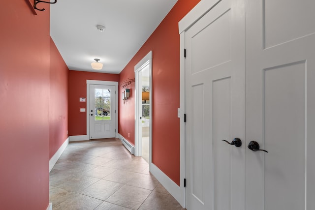 246 Coombs Rd, Brunswick, ME 04011 - entryway with a baseboard heating unit and baseboards